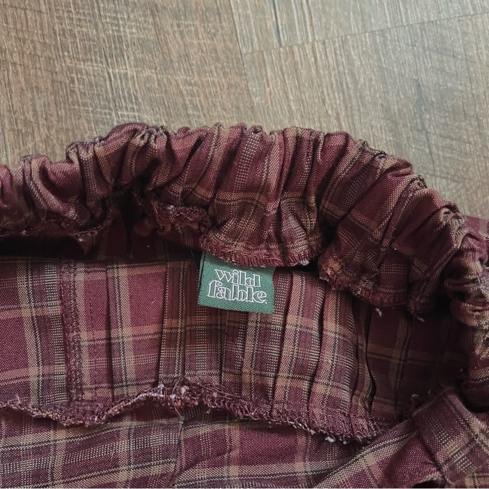 Red, black, and black tanned skirt